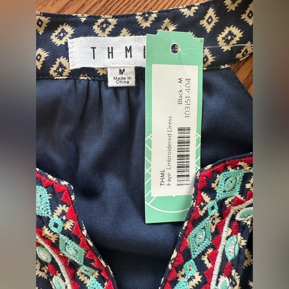 NWT! THML NAVY BOHEMIAN FAYE EMBROIDERED DRESS
SIZE: MEDIUM - Picture 7 of 9